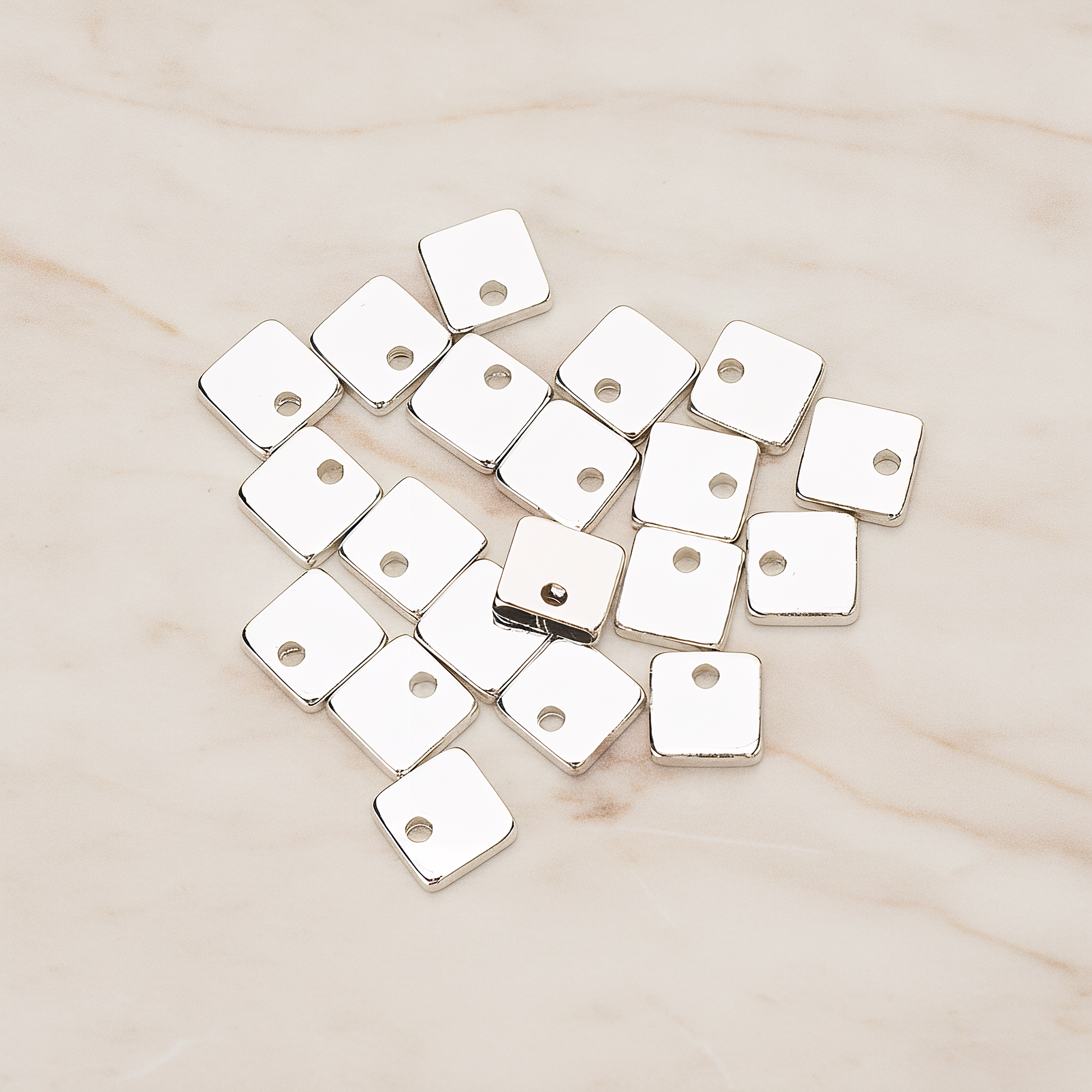 Simple Geometric 6 Mm Square Charm Pendant, 4 Pc on warm marble background (PD.1486)