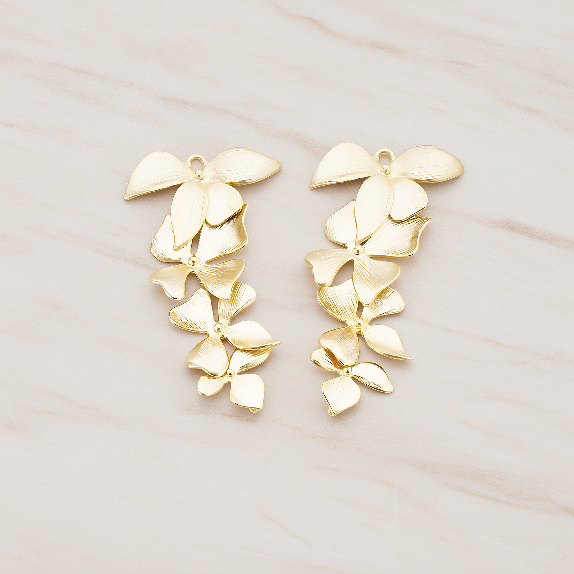 Quadruple Flower Pendant, 2 Pc on warm marble background (PD.148)