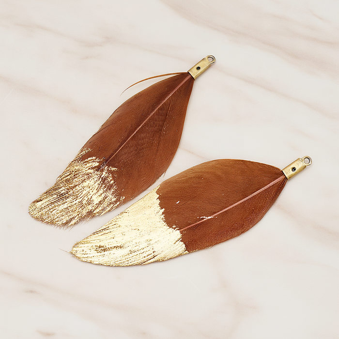 Artificiality Feather Half Dipped in Gold Pendant, 2 Pc on warm marble background (PD.1492-01)