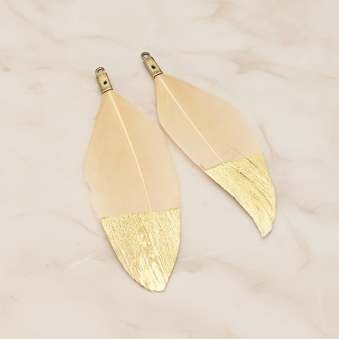 Artificiality Feather Half Dipped in Gold Pendant, 2 Pc on warm marble background (PD.1492-01)