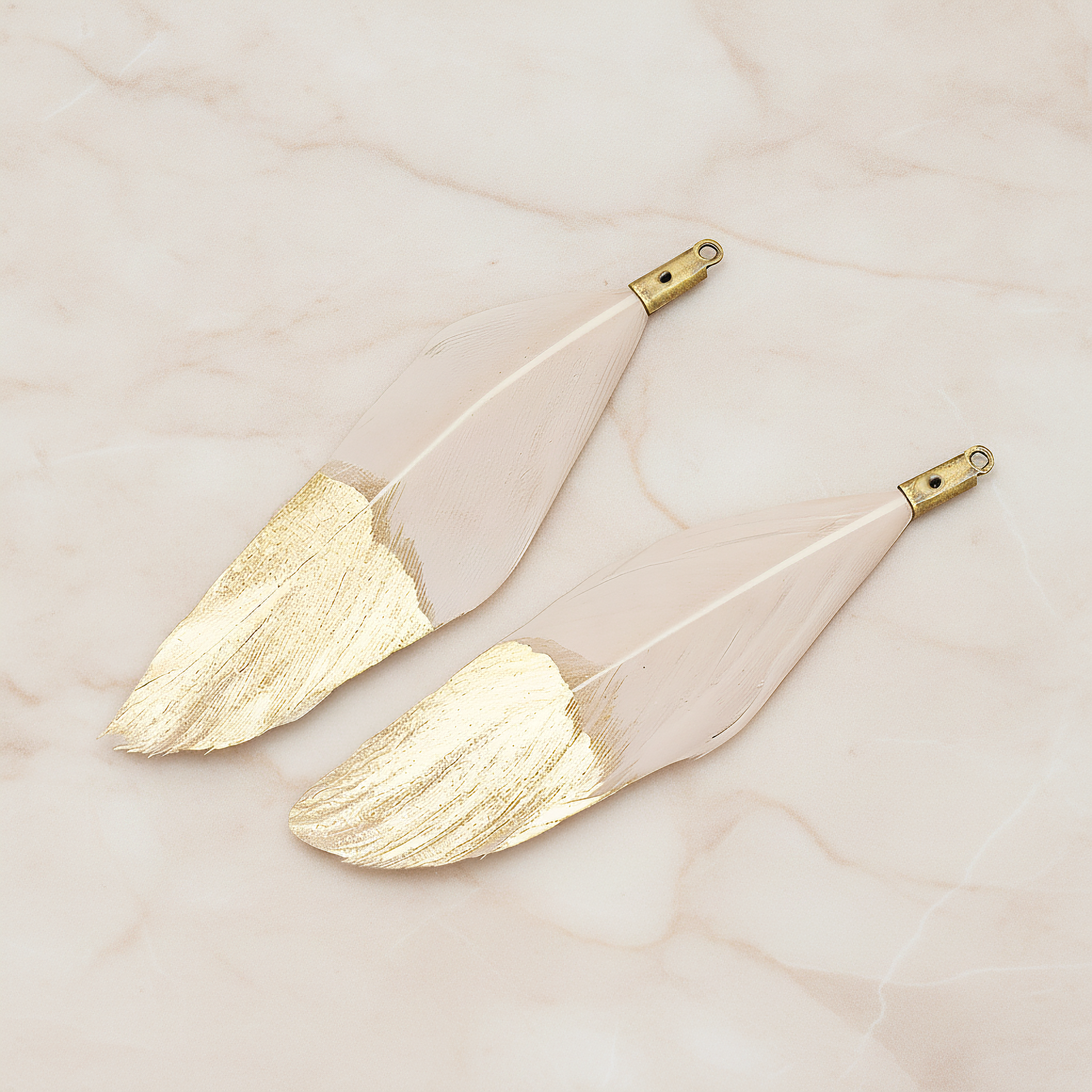 Artificiality Feather Half Dipped in Gold Pendant, 2 Pc on warm marble background (PD.1492-01)