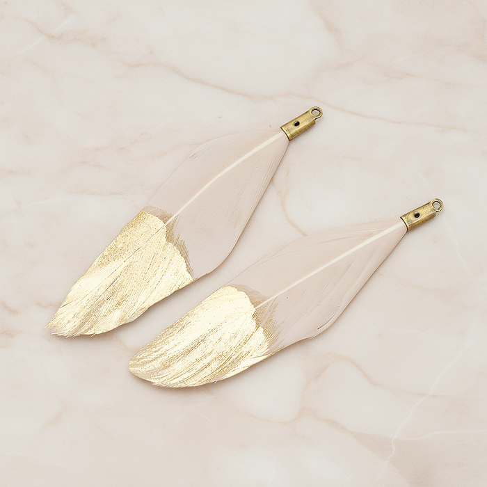 Artificiality Feather Half Dipped in Gold Pendant, 2 Pc on warm marble background (PD.1492-01)
