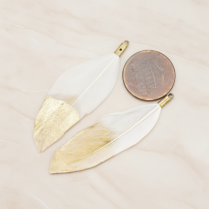 Artificiality Feather Half Dipped in Gold Pendant, 2 Pc on warm marble background (PD.1492-01)