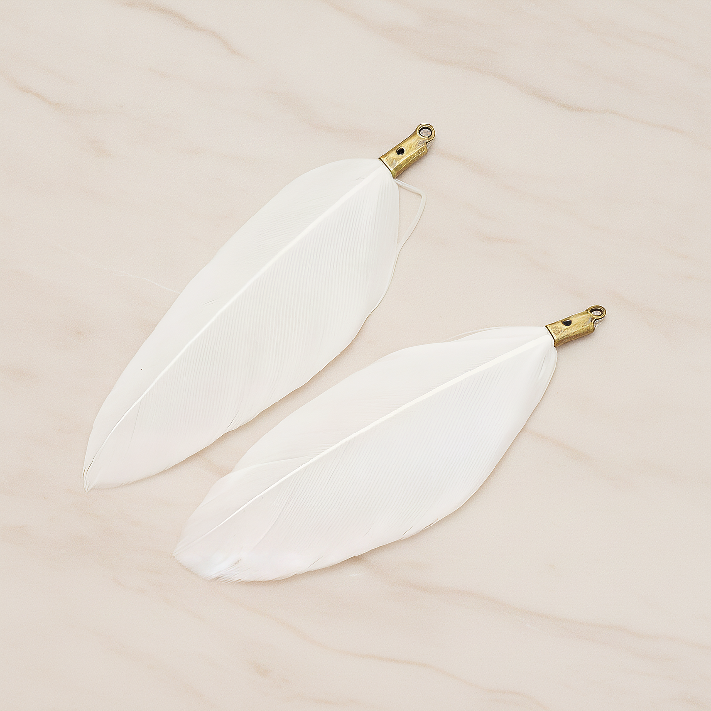 Simple Artificiality Feather Pendant, 2 Pc on warm marble background (PD.1492-02)