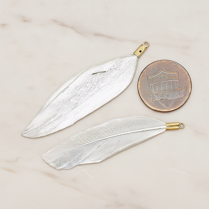 Artificiality Feather Charm Pendant, 2 Pc on warm marble background (PD.1492-04)