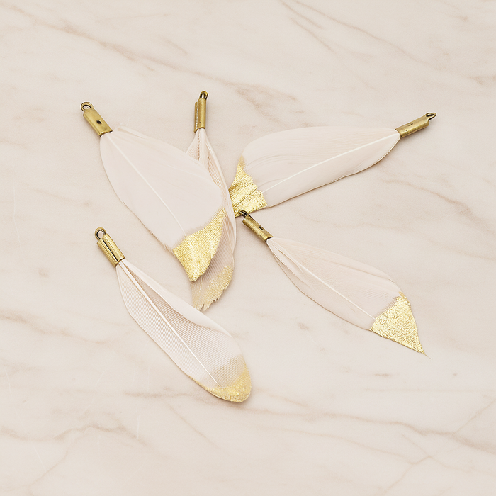 Small Artificiality Feather Half Dipped in Gold Colored Pendant, 2 Pc on warm marble background (PD.1492-05)