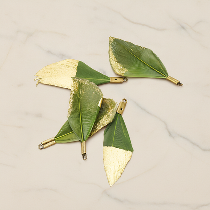 Small Artificiality Feather Half Dipped in Gold Colored Pendant, 2 Pc on warm marble background (PD.1492-05)