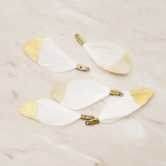 Small Artificiality Feather Half Dipped in Gold Colored Pendant, 2 Pc on warm marble background (PD.1492-05)