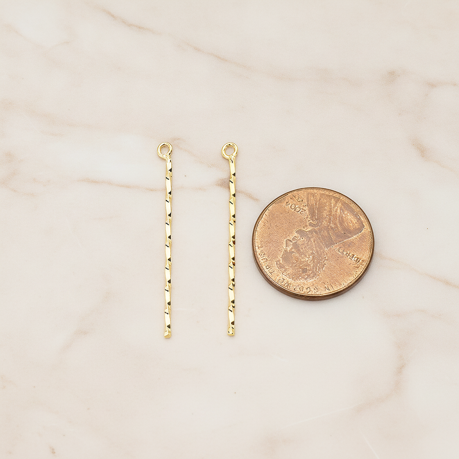 Thin Twisted Bar Charm 32mm Pendant, 2 Pc on warm marble background (PD.1571-01)