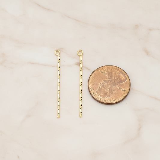 Thin Twisted Bar Charm 32mm Pendant, 2 Pc on warm marble background (PD.1571-01)