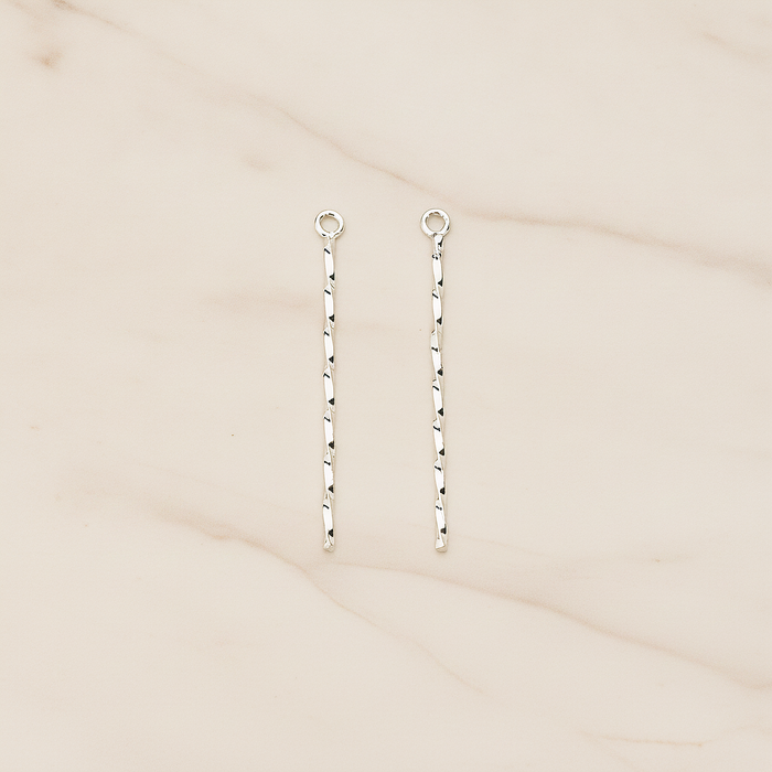 Thin Twisted Bar Charm 32mm Pendant, 2 Pc on warm marble background (PD.1571-01)