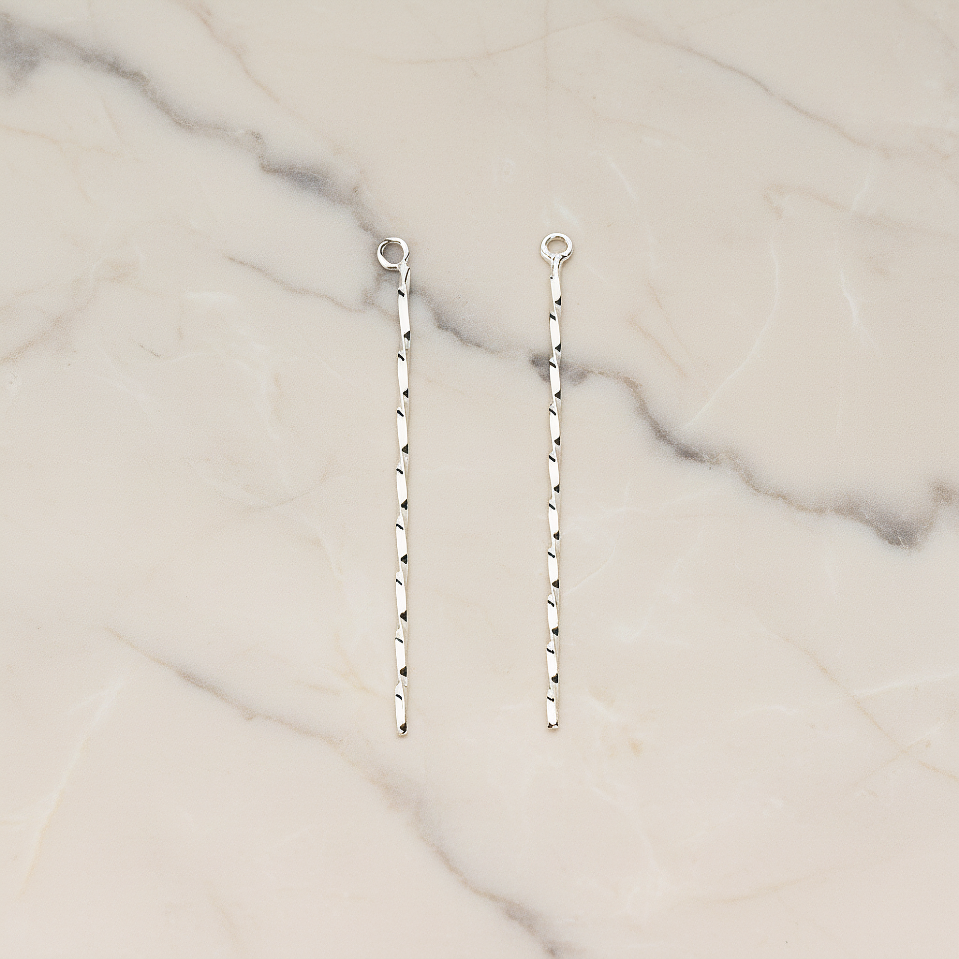 Thin Long Twisted Bar Charm 42mm Pendant, 2 Pc on warm marble background (PD.1571-02)