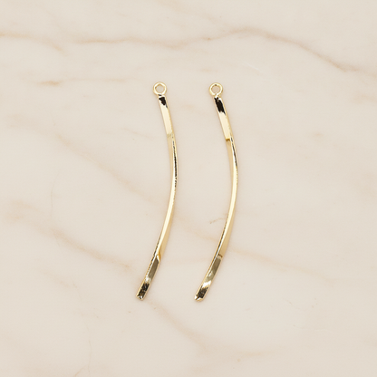 Curved Flattened Twisted Bar Charm 42mm Pendant, 2 Pc on warm marble background (PD.1575-01)