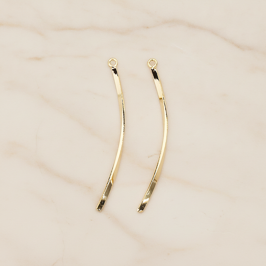 Curved Flattened Twisted Bar Charm 42mm Pendant, 2 Pc on warm marble background (PD.1575-01)