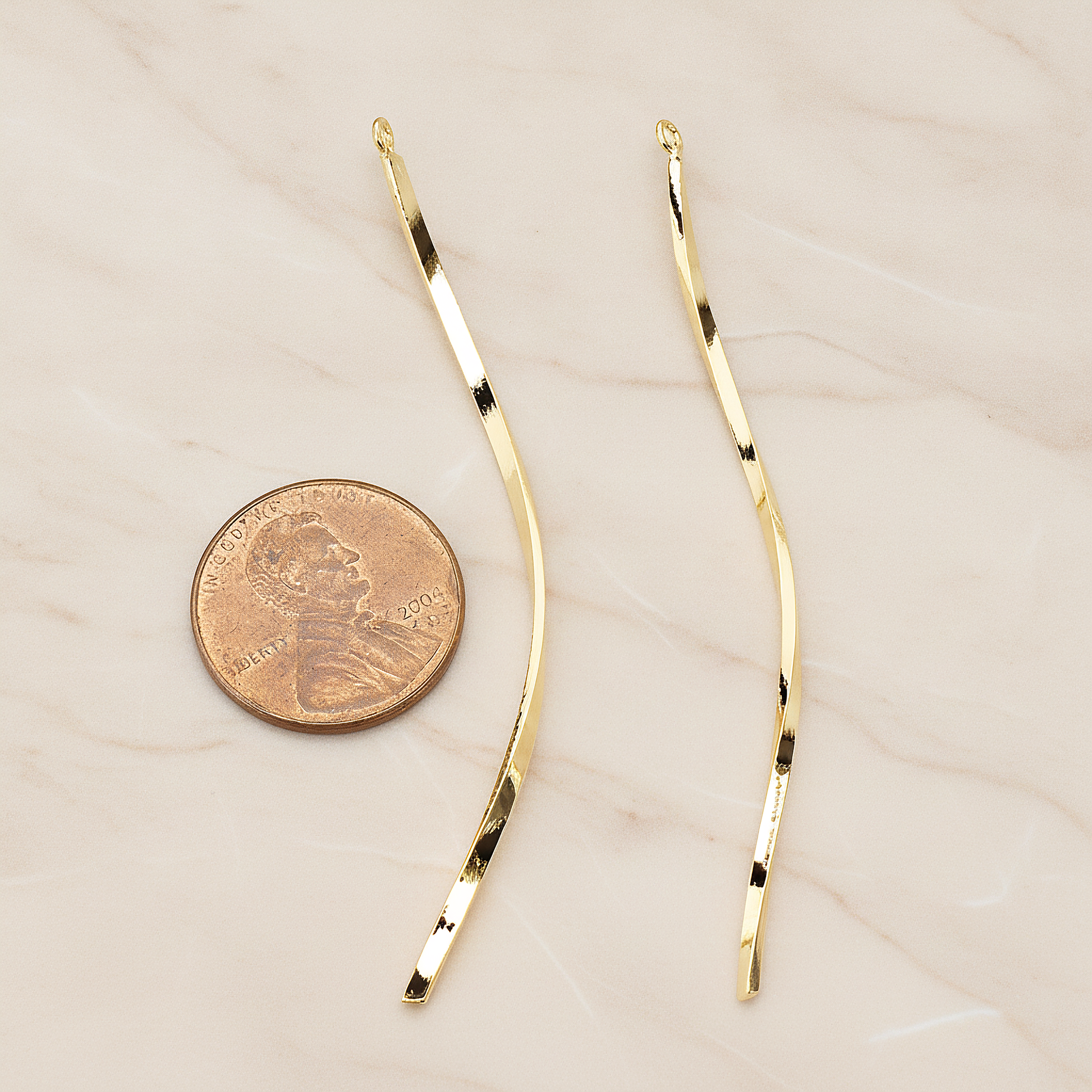 Curved Flattened Twisted Long Bar Charm 62mm Pendant, 2 Pc on warm marble background (PD.1575-02)