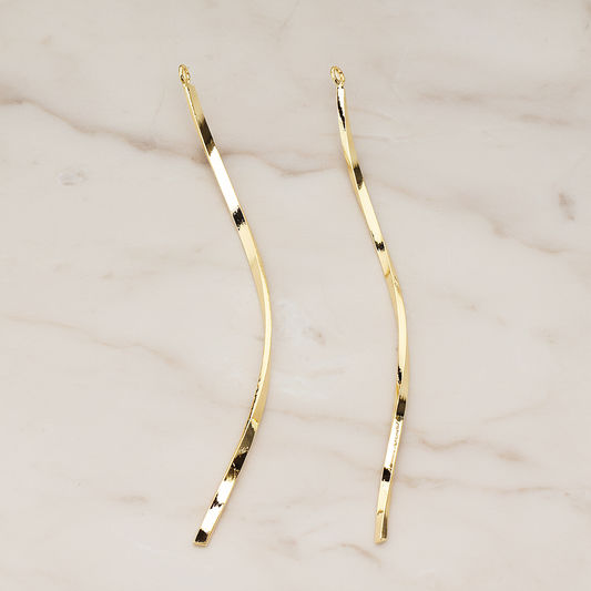 Curved Flattened Twisted Long Bar Charm 62mm Pendant, 2 Pc on warm marble background (PD.1575-02)