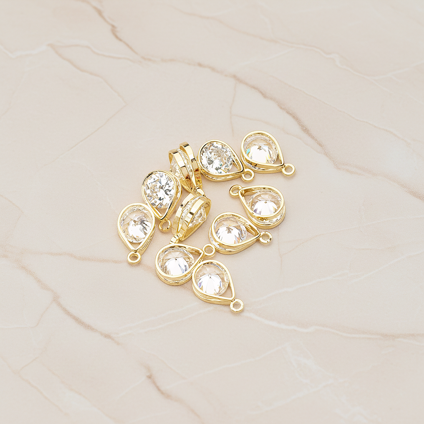 Double Teardrop Sandwitch Framed Cubic Ziconia Charm Pendant, 2 Pc on warm marble background (PD.1579-01)