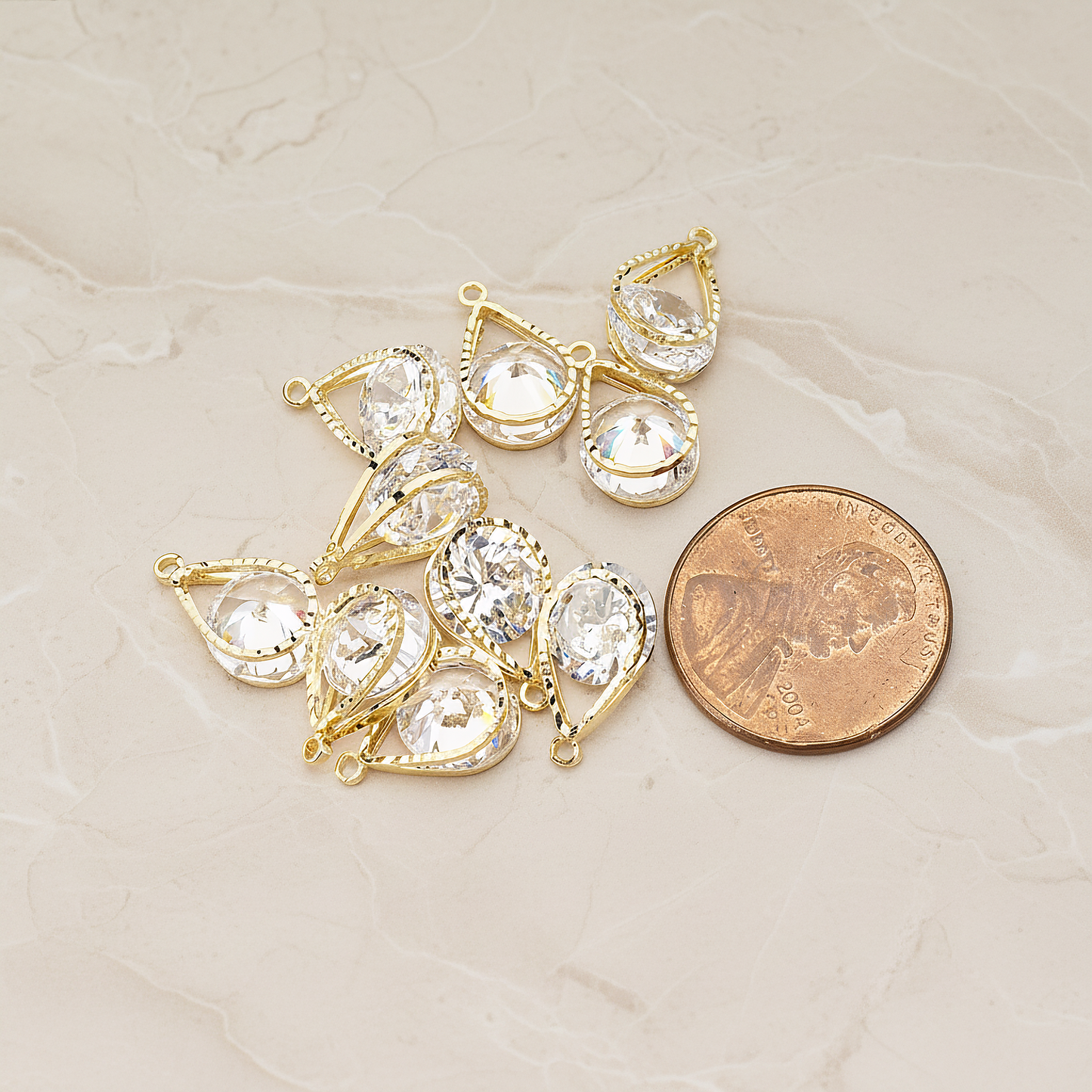 Double Large Teardrop Sandwitch Framed Cubic Ziconia Charm Pendant, 2 Pc on warm marble background (PD.1579-02)