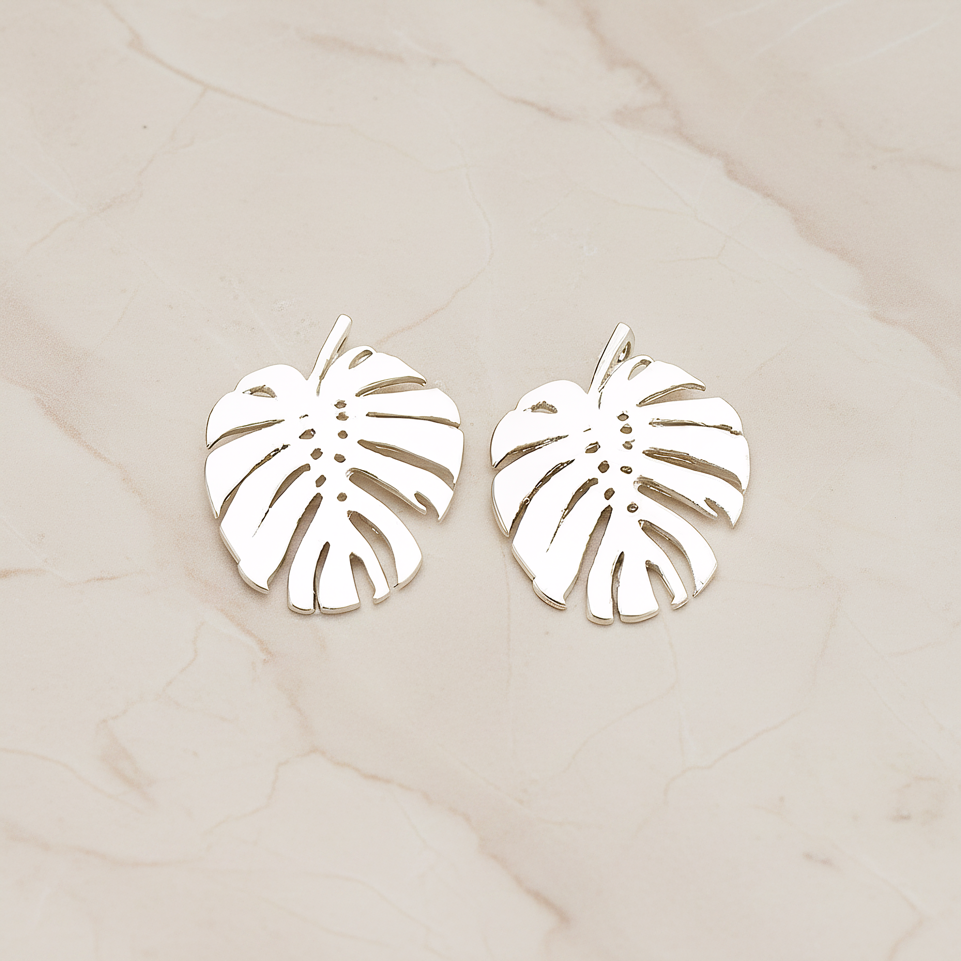 Monstera Leaf Plated Pendant, 2 Pc on warm marble background (PD.1605)