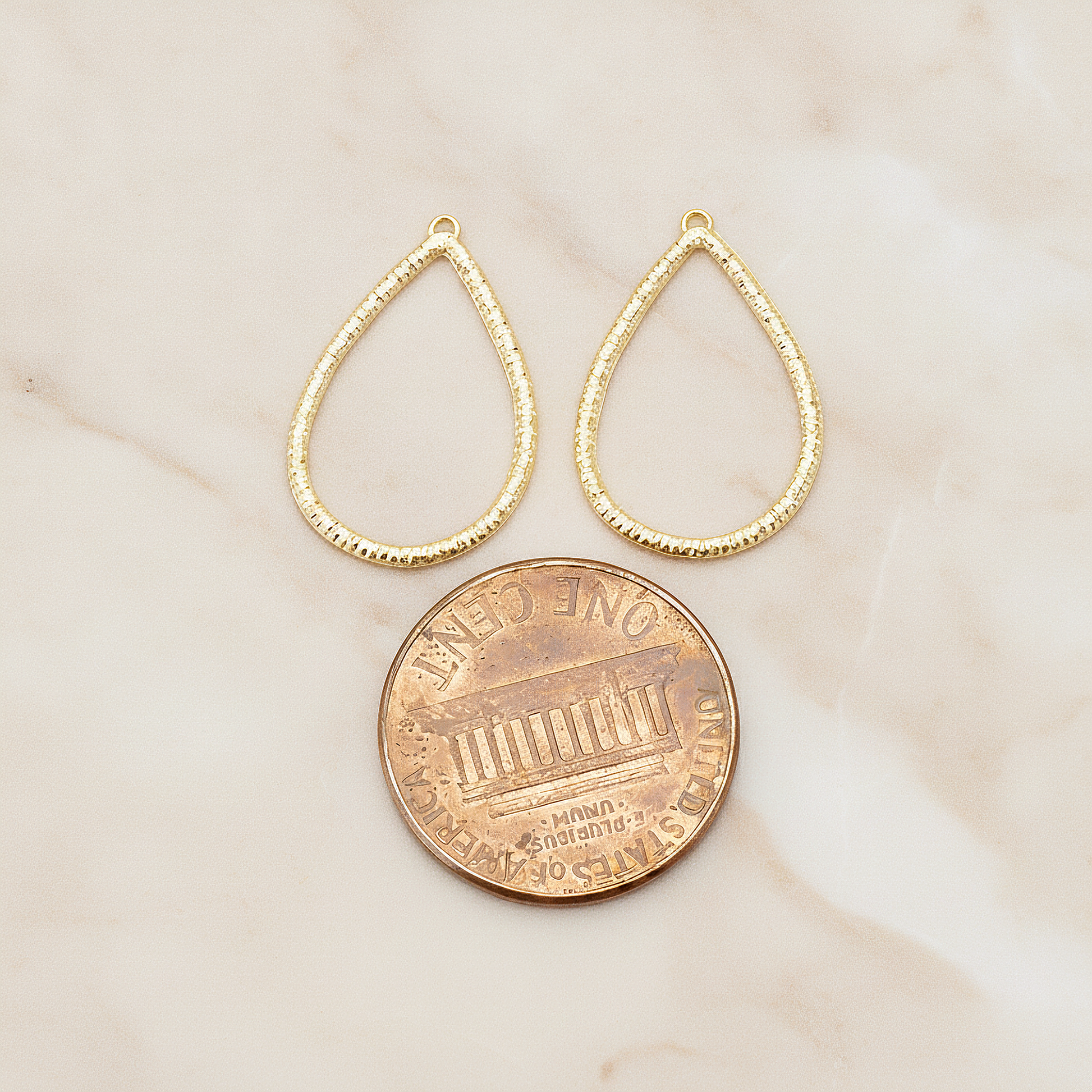 Textured Teardrop Small Link Pendant, 2 Pc on warm marble background (PD.1623-01)