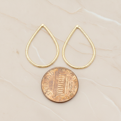 Textured Teardrop Link Pendant, 2 Pc on warm marble background (PD.1623-02)