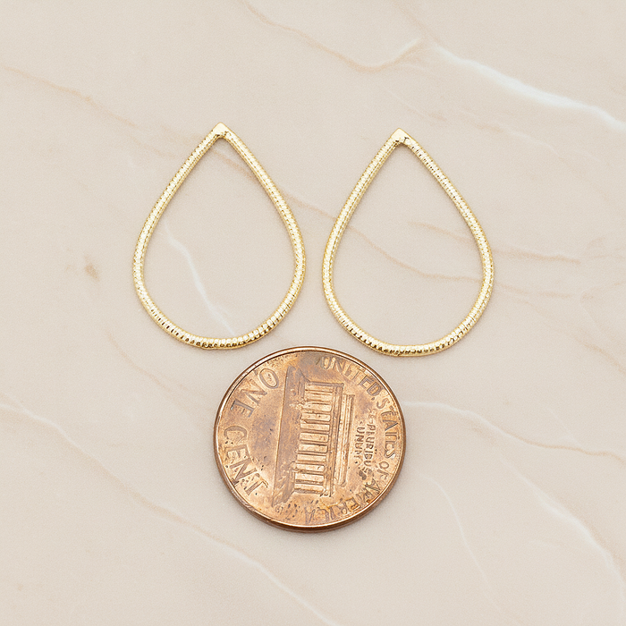 Textured Teardrop Link Pendant, 2 Pc on warm marble background (PD.1623-02)