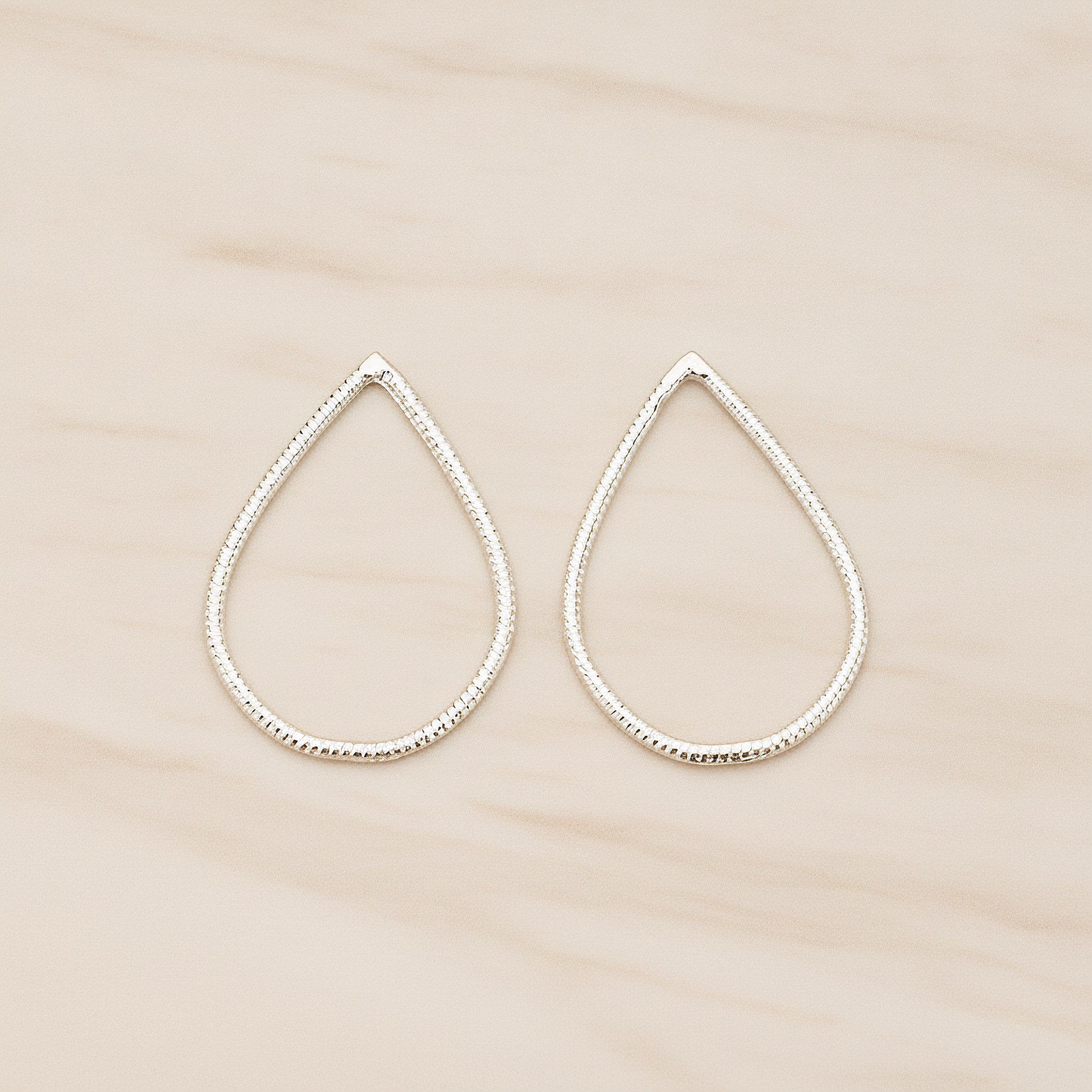 Textured Teardrop Link Pendant, 2 Pc on warm marble background (PD.1623-02)