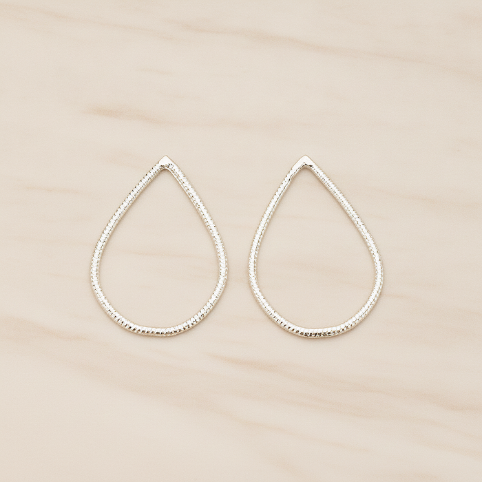 Textured Teardrop Link Pendant, 2 Pc on warm marble background (PD.1623-02)