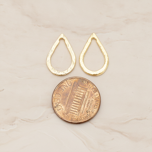 Slash Textured Teardrop Small Link Pendant, 2 Pc on warm marble background (PD.1624-01)