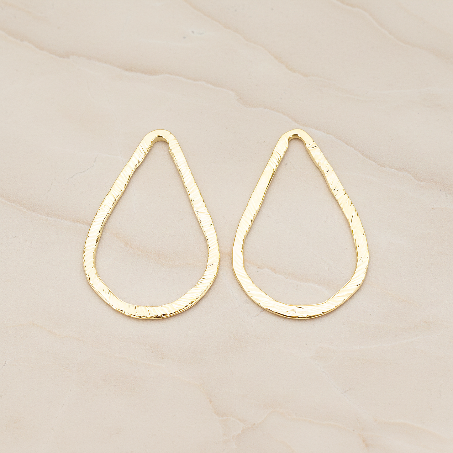 Slash Textured Teardrop Medium Link Pendant, 2 Pc on warm marble background (PD.1624-02)