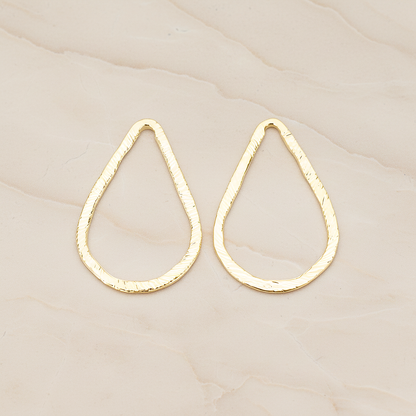 Slash Textured Teardrop Medium Link Pendant, 2 Pc on warm marble background (PD.1624-02)