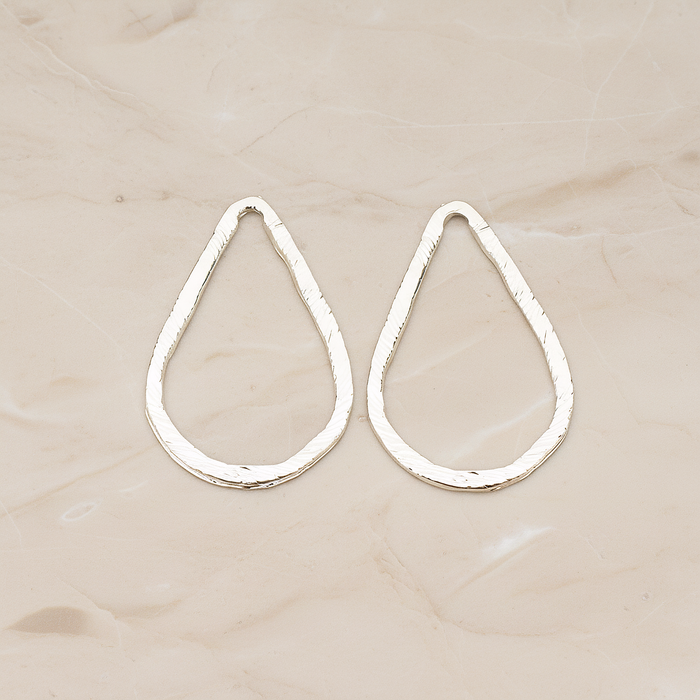 Slash Textured Teardrop Medium Link Pendant, 2 Pc on warm marble background (PD.1624-02)