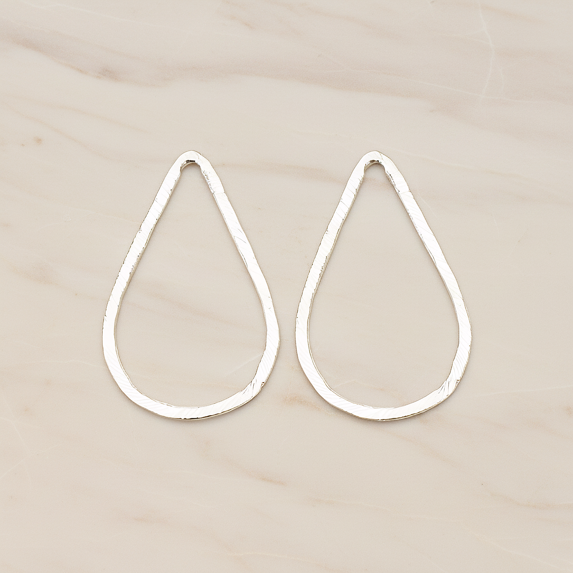 Slash Textured Teardrop Large Link Pendant, 2 Pc on warm marble background (PD.1624-03)