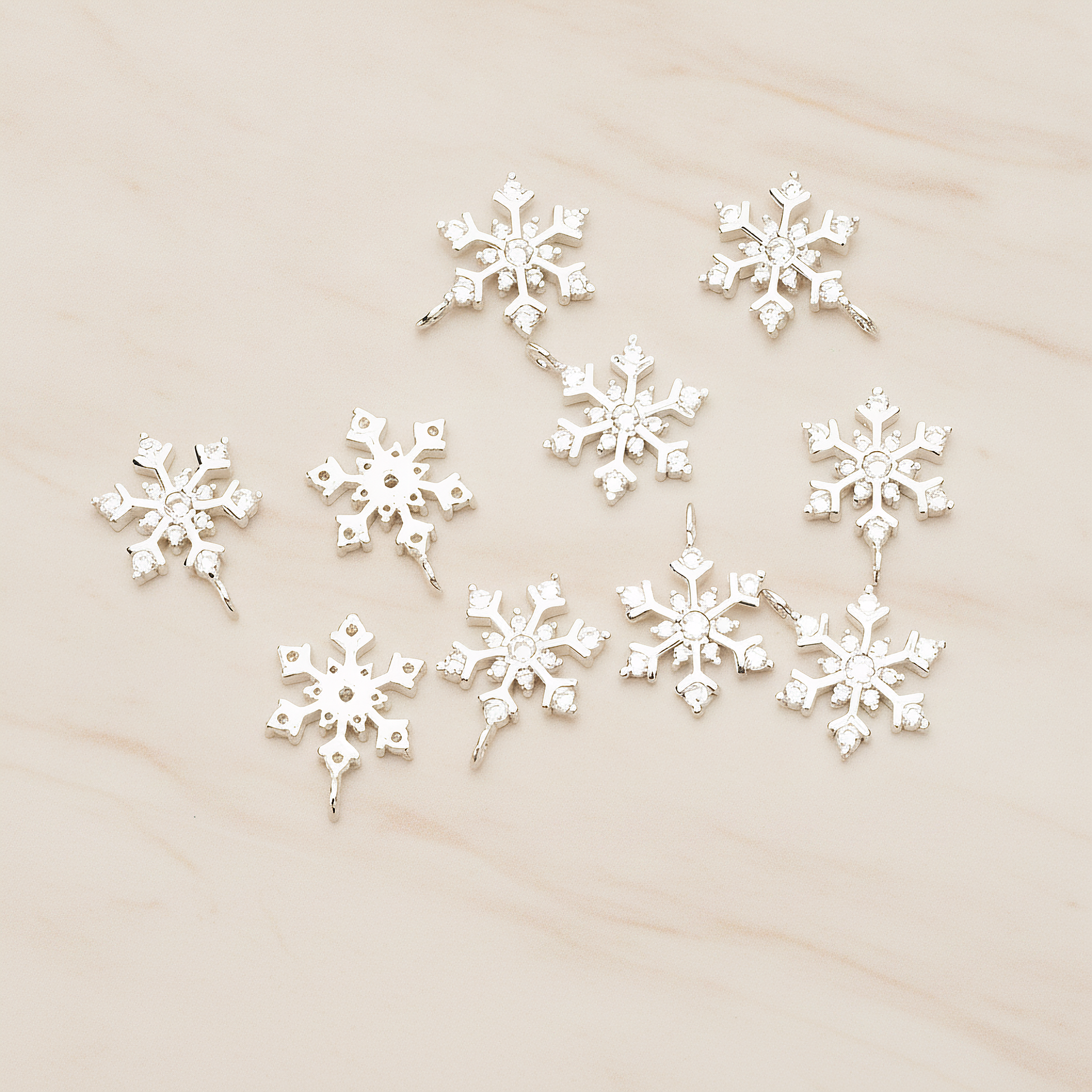Snowflake Cubic Setting Pendant, 2 Pc on warm marble background (PD.1631-02)