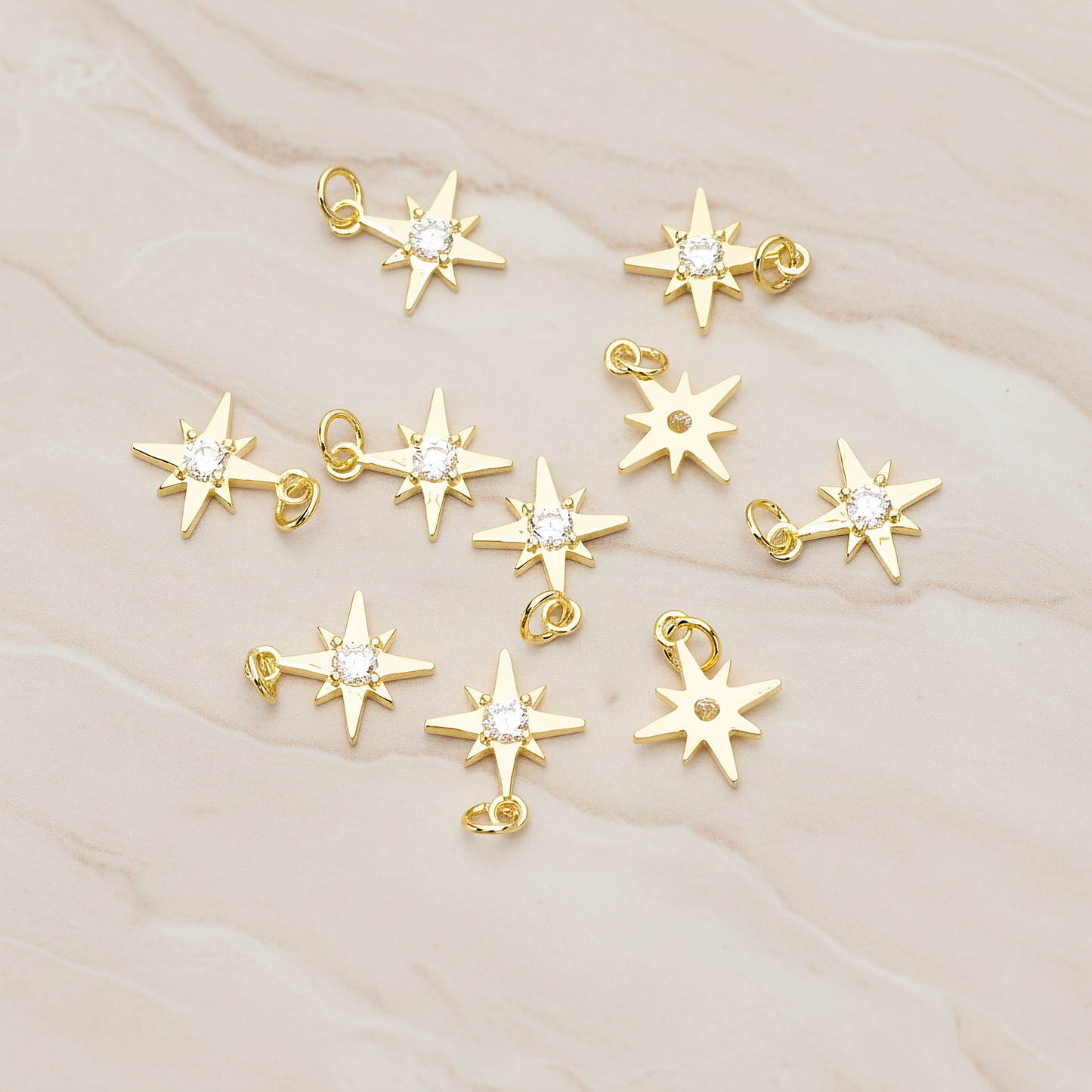 Shiny Star Cubic Setting Pendant, 2 Pc on warm marble background (PD.1633)