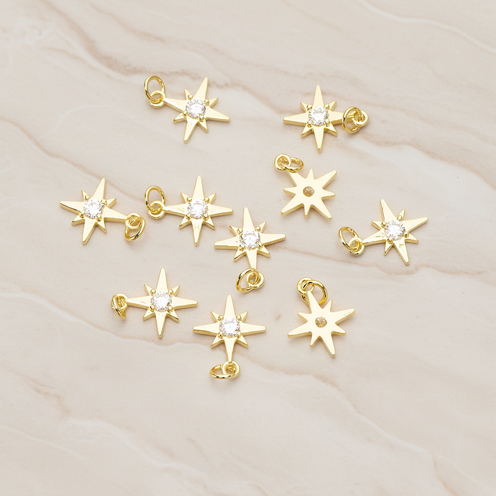 Shiny Star Cubic Setting Pendant, 2 Pc on warm marble background (PD.1633)