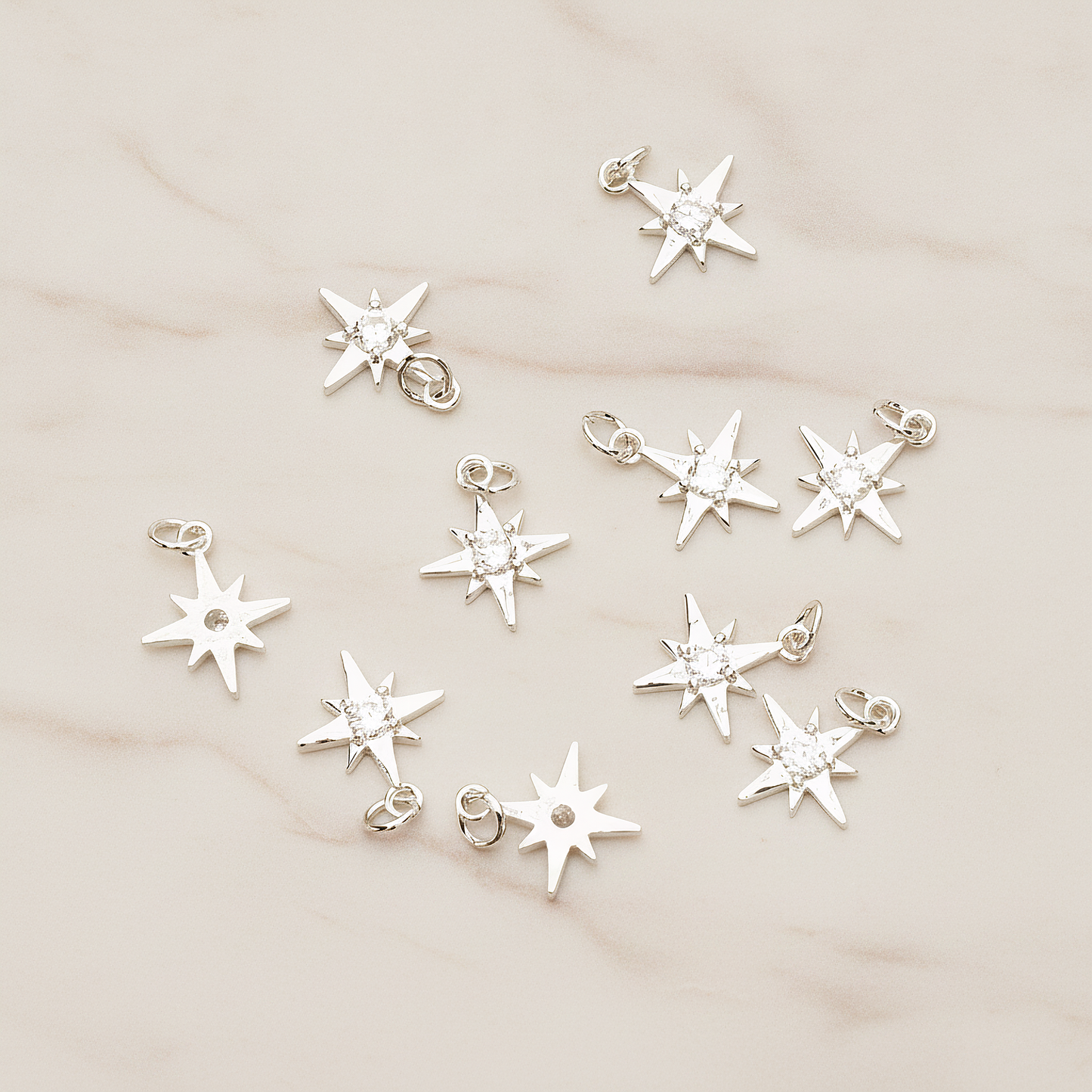 Shiny Star Cubic Setting Pendant, 2 Pc on warm marble background (PD.1633)