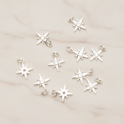 Shiny Star Cubic Setting Pendant, 2 Pc on warm marble background (PD.1633)