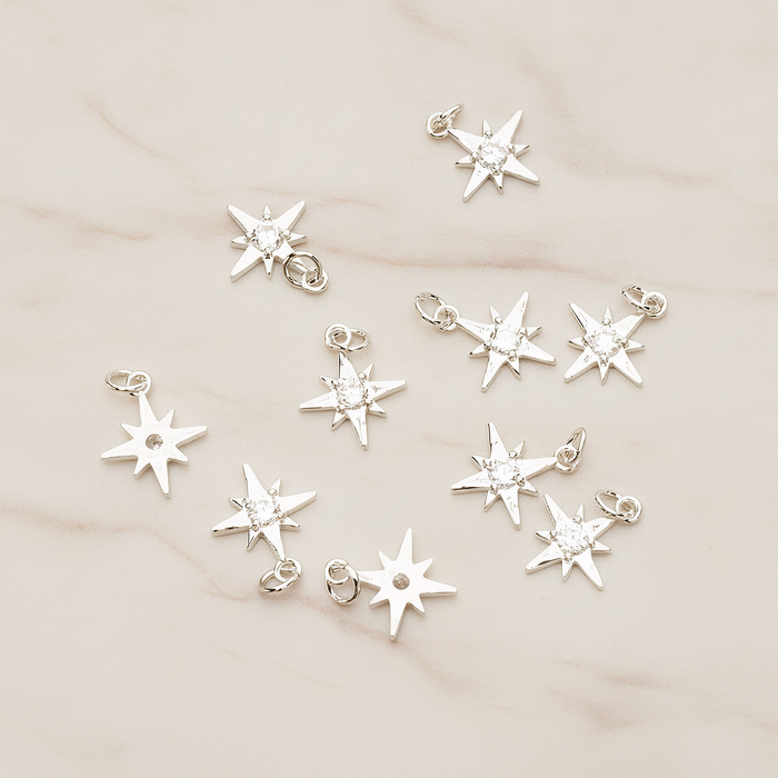 Shiny Star Cubic Setting Pendant, 2 Pc on warm marble background (PD.1633)
