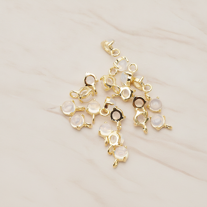 Tiny Round Crystal Pendant, 2 Pc on warm marble background (PD.1652)