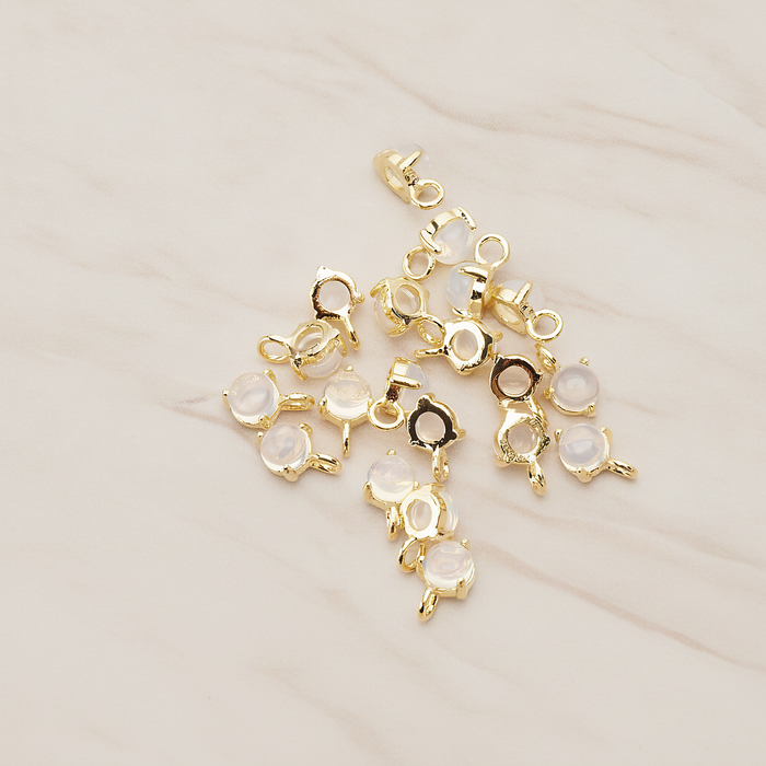Tiny Round Crystal Pendant, 2 Pc on warm marble background (PD.1652)