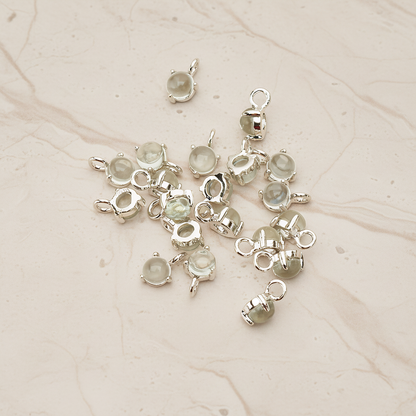 Tiny Round Crystal Pendant, 2 Pc on warm marble background (PD.1652)