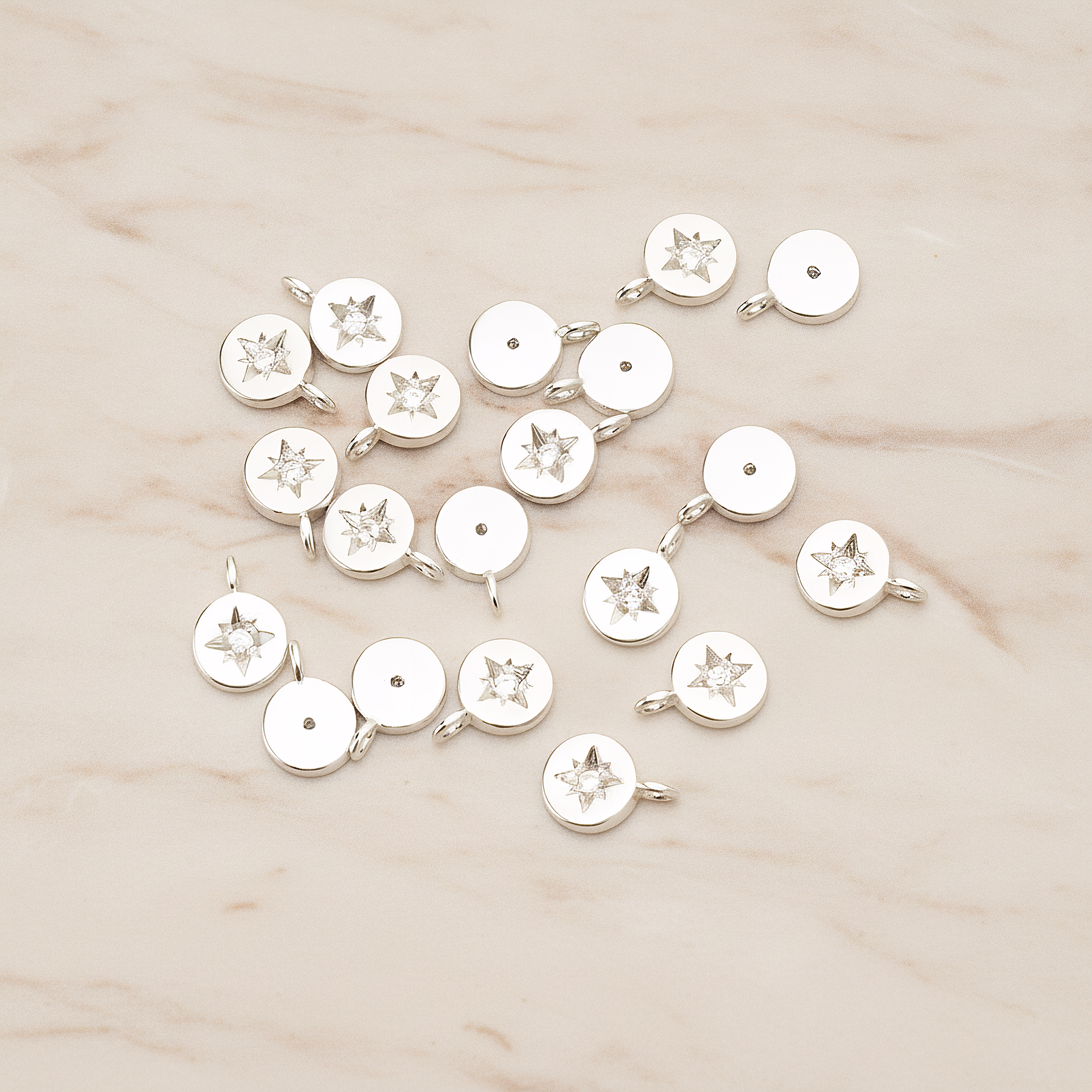 Round Cubic Setting Shining Star Pendant, 2 Pc on warm marble background (PD.1674)