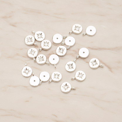 Round Cubic Setting Shining Star Pendant, 2 Pc on warm marble background (PD.1674)