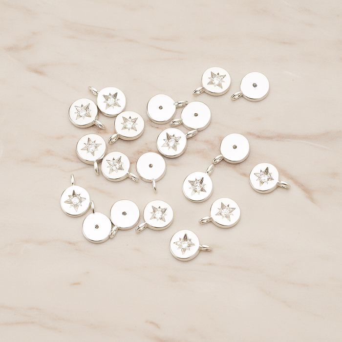 Round Cubic Setting Shining Star Pendant, 2 Pc on warm marble background (PD.1674)