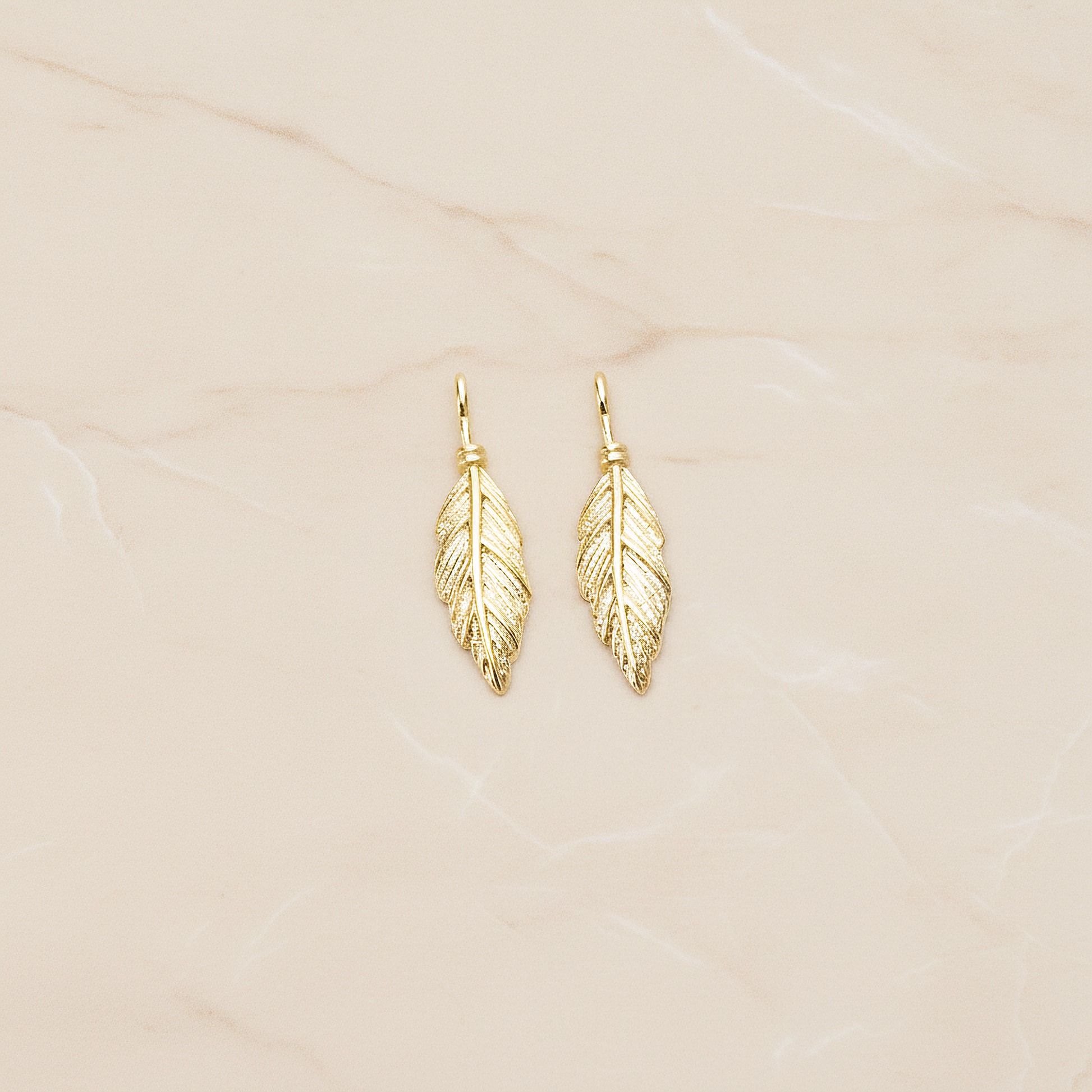 Feather Like Leaf Plated Pendant, 2 Pc on warm marble background (PD.1687)