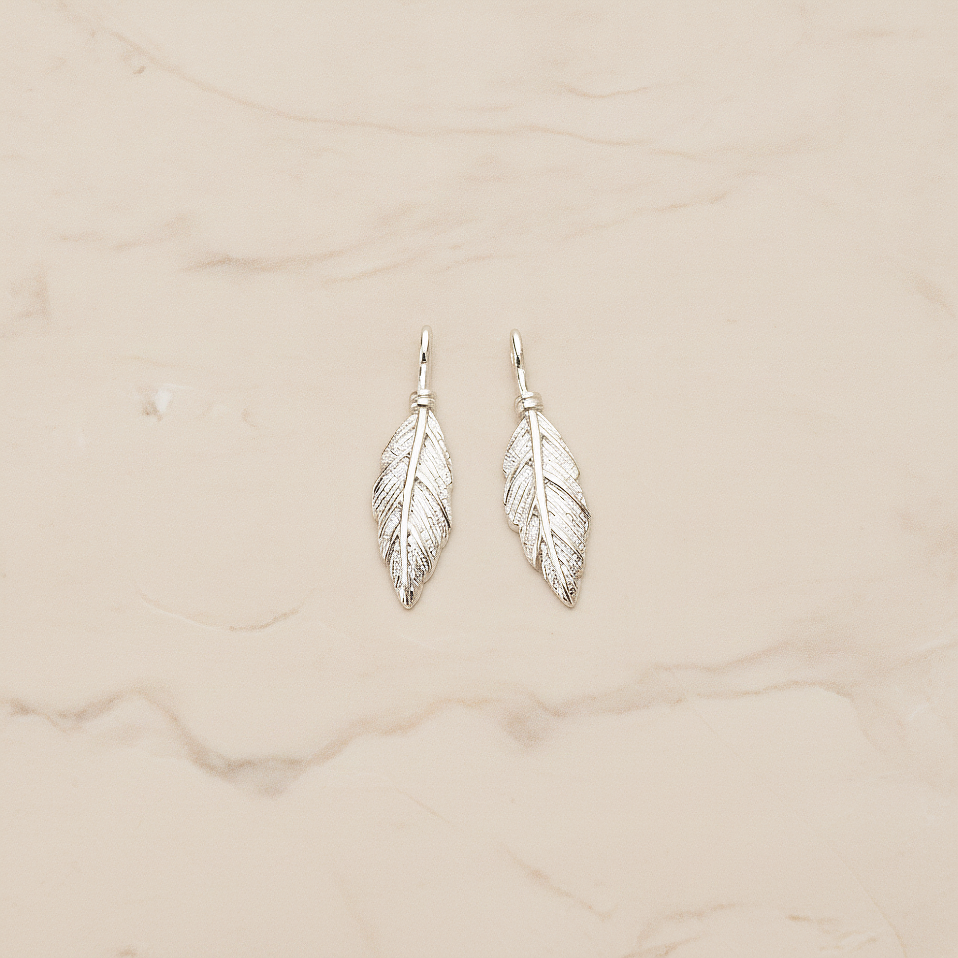 Feather Like Leaf Plated Pendant, 2 Pc on warm marble background (PD.1687)