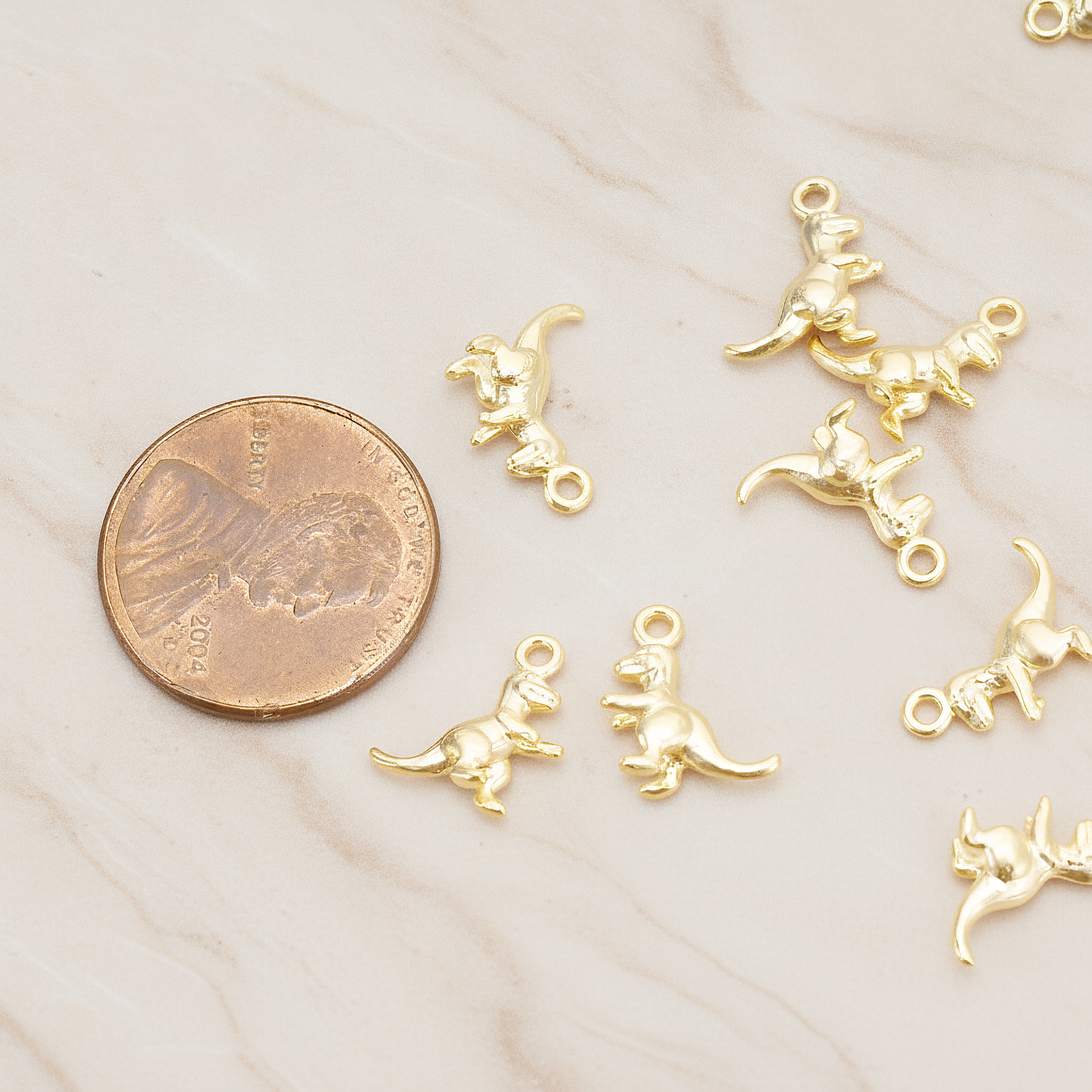 Small Dinosour Pendant, 2 Pc on warm marble background (PD.1694)