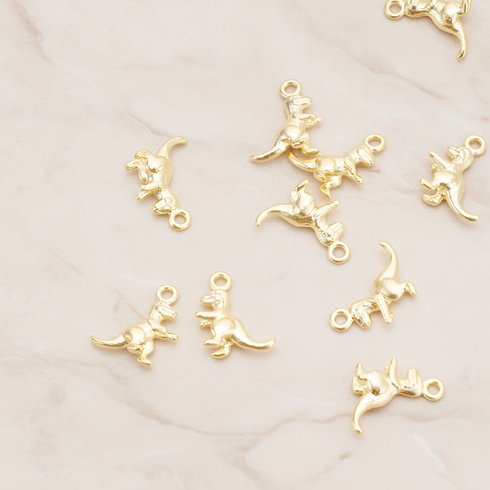Small Dinosour Pendant, 2 Pc on warm marble background (PD.1694)