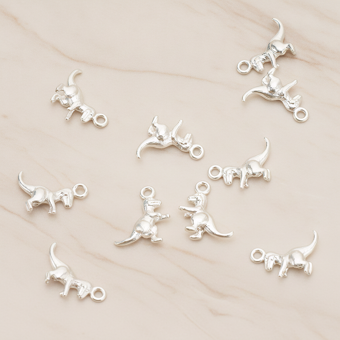 Small Dinosour Pendant, 2 Pc on warm marble background (PD.1694)